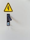 Vertical shot of electrocution hazard icon sticker on power panel door