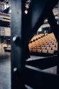 Vertical shot of an empty theatre auditorium with a lot of chairs in Roubaix, France