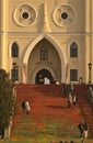 Vertical shot of the entrance of white Lublin Castle with stairs in the daytime in Lublin, Poland