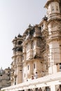 Vertical shot of the exterior of the City Palace complex in Udaipur in the Indian state of Rajasthan