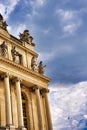 Vertical shot of the exterior facade of the historic Palace of Versailles in France