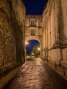 Vertical shot of the famous Arco de Sao Vicente in Lisbon, Portugal, during the night