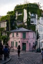 Vertical shot of the famous pink house in Montmartre, Paris