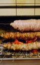 Vertical shot of the famous Turkish food kokorech being prepared