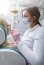 Female dentist working at her clinic Royalty Free Stock Photo