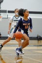 Vertical shot of the female team players of Hammond vs Westside playing on indoor court in Hammond Royalty Free Stock Photo