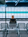 Vertical shot of a female waiting for the train in Bayerischer Platz u-Bahn station, Berlin, Germany Royalty Free Stock Photo