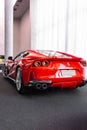 Vertical shot of the Ferrari 812 super fast with the front wheel turned