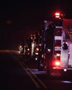 Vertical shot of fire engines at night Royalty Free Stock Photo