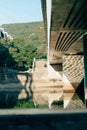 Vertical shot of the foundation of a bridge over the canal