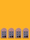 Vertical shot of four identical windows with copy space above, orange color background