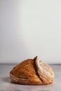 Vertical shot of freshly baked whole sourdough bread crust