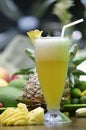 Vertical shot of a glass of pineapple juice