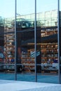 Vertical shot of the glass window full of books. Sanya, China