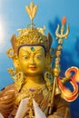 Statue of tibetan buddhist master Guru Rimpoche or Padmasambhava. Royalty Free Stock Photo