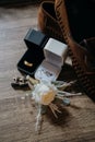 Vertical shot of golden bridal rings in boxes