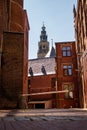 Vertical shot of the governmental buildings of Groningen, with the Martini tower in the background