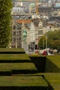 Vertical shot of the green Jardin du Monts des Arts with statue of King Albert the First