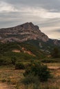 Vertical shot of the green valley with Montagne Sainte-Victoire in the background. France.