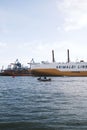 Vertical shot of the Grimaldi line cargo ship on the waters of the port of Hamburg Royalty Free Stock Photo