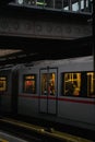 Vertical shot of a group of people on a train in Vienna, Austria