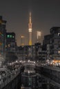 Vertical shot of Guangzhou city night with an illuminated tower