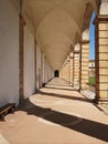 Vertical shot of the hallway in the famous Certosa of Padula in Italy