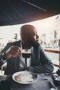 African businessman drinking coffee Royalty Free Stock Photo