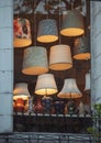 Vertical shot of hanging lamps visible thro