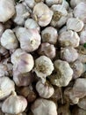 Vertical shot of a heap of garlic