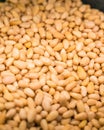 Vertical shot of a heap of pine nuts