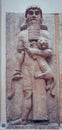 Vertical shot of The Hero Overpowering a Lion, Louvre, Paris