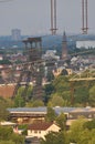 Vertical shot of high voltage power lines over a background of the Ruhr are