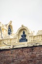 Vertical shot of a Hindu idol artwork on the outside of the Varaha Lakshmi Narasimha temple in India