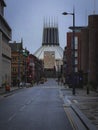 Vertical shot of the historic Liverpool Metropolitan Cathedral near the road in the UK