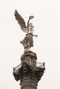 Vertical shot of the historic statue Angel of Independence in downtown Mexico city