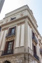 Vertical shot of historical building facade in La Rambla street in Barcelona, Catalonia, Spain