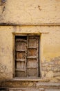 Vertical shot of a historical wooden door of a building in Rajasthan, India Royalty Free Stock Photo