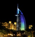 Vertical shot of the hotel Burj al Arab with lights at night in Dubai Royalty Free Stock Photo