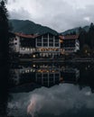 Vertical shot of the Hotel reflected in lake near Gamrisch-Partenkirchen, Germany