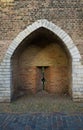 Vertical shot of a huge door of stone in Delft, Netherlands