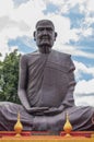 Vertical shot of a huge statue in Prasat wat sa kamphaeng Yai in Sisaket, Thailand