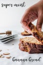 Vertical shot of human hand touching bread with banana bread and super moist writings