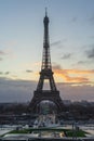 Vertical shot of the iconic Eiffel Tower at sunset