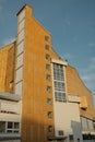 Vertical shot of an imposing golden facade of the Berlin Philharmonic Hall in Berlin, Germany