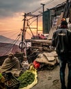 Vertical shot of Indian males at the market at sunset in Shimla, India Royalty Free Stock Photo