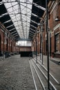 Vertical shot of the inside of a building with arch doors in Roubaix, France