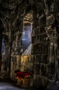 Vertical shot of the inside of the historic Geghard Monastery in Armenia