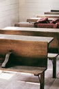 Vertical shot of the interior of a historic one-room school house from the 1800s Royalty Free Stock Photo