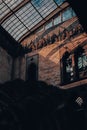 Vertical shot of the interior of the museum with windows on the ceiling in Boston